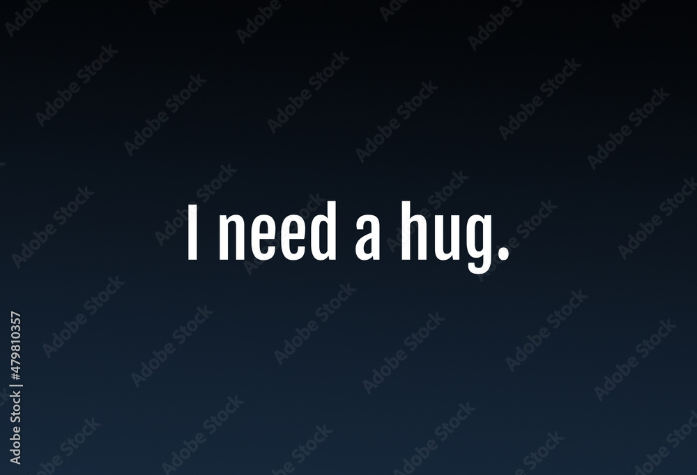 A computer screen message with the (both funny and sad) text message: I need a hug. Dark blue color tones.
