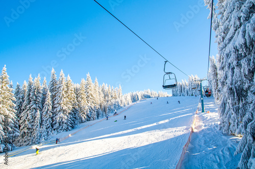 Carpathian mountains in winter in Romania, ski resort Paltinis, Sibiu