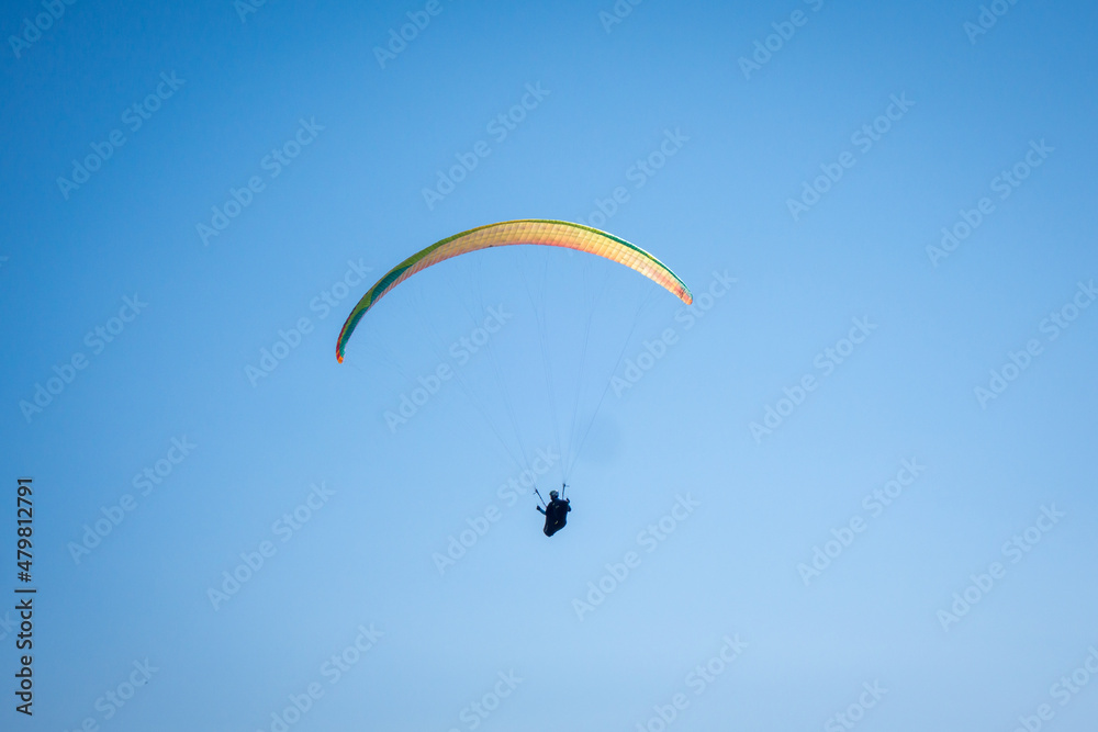 paragliding flight in the mountains. Le Grand-Bornand, France paragliding flight in the mountains. Le Grand-Bornand, France