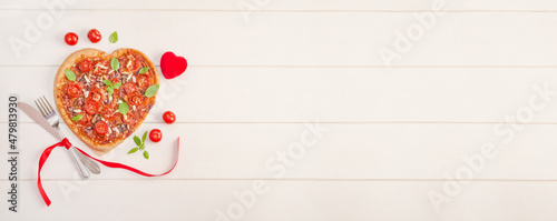 Valentine's Day banner with pizza heart on white wooden background with copy space
