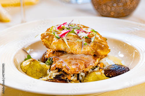 Chicken Francaise with Sauteed Artichokes, Wild Rice and Mushrooms photo