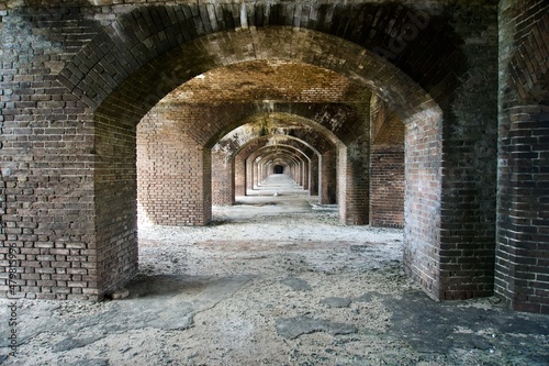 Fort Jefferson, Dry Tortugas National Park, Florida Keys. Brick arches Gunrooms known as casemates, form a honeycomb of brick masonry arches. Linear or geometric perspective to the vanishing point. 