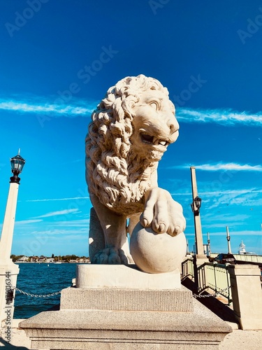 The Bridge of Lions spans the Intracoastal Waterway in St. Augustine, Florida, United States. Connects downtown St. Augustine to Anastasia Island. A pair of copies of the marble Medici lions guard.  photo