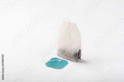 Tea bag on a white background. Tea bag close-up for insulation