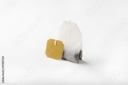 Tea bag on a white background. Tea bag close-up for insulation