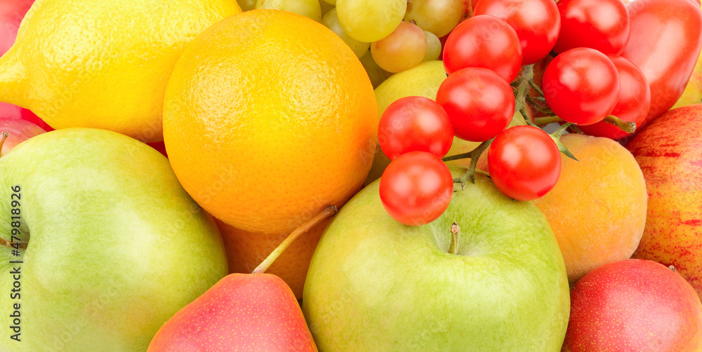 Beautiful background from various fruits and vegetables. Wide photo.