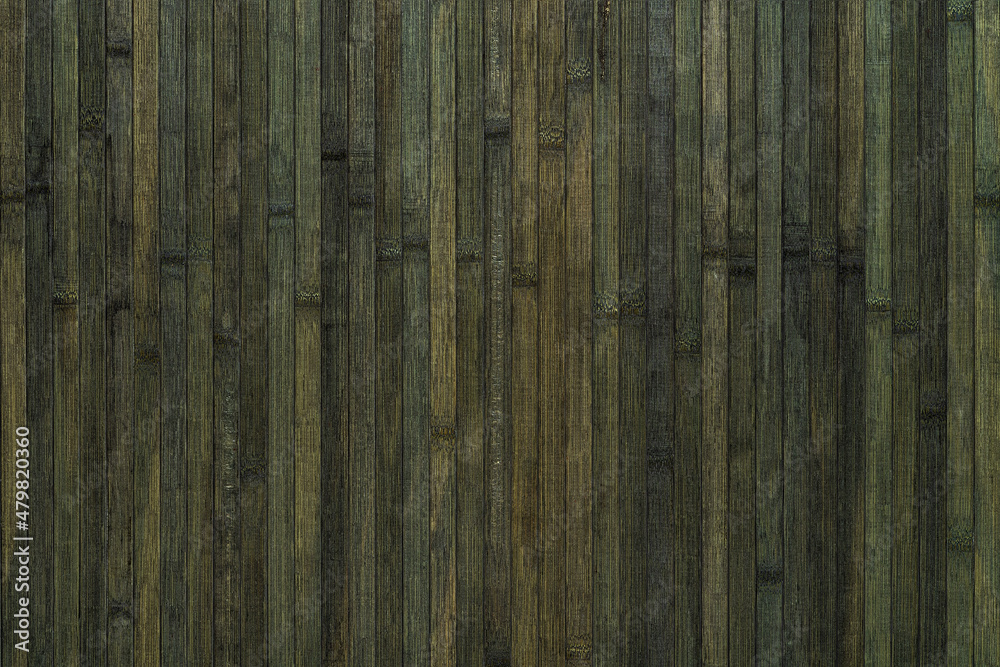 Vertical lacquered bamboo wood planks with striped pattern background. Surface of greenish black colored bamboo boards texture. Dark element for interior design. Full frame. Vertical lacquered bamboo wood planks with striped pattern background. Surface of greenish black colored bamboo boards texture. Dark element for interior design. Full frame.