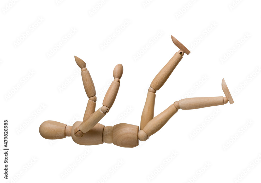broken wooden dummy fell on his back, isolated on white background broken wooden dummy fell on his back, isolated on white background