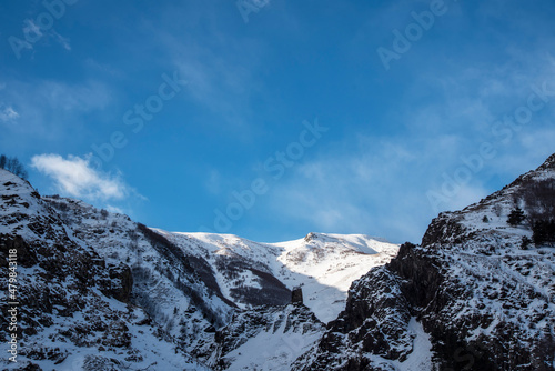 High snow covered mountains. Winter mountains landscape. © Inga Av