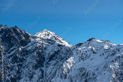 Beautiful winter mountains landscape. High snow covered mountains. Georgia, Kazbegi.
