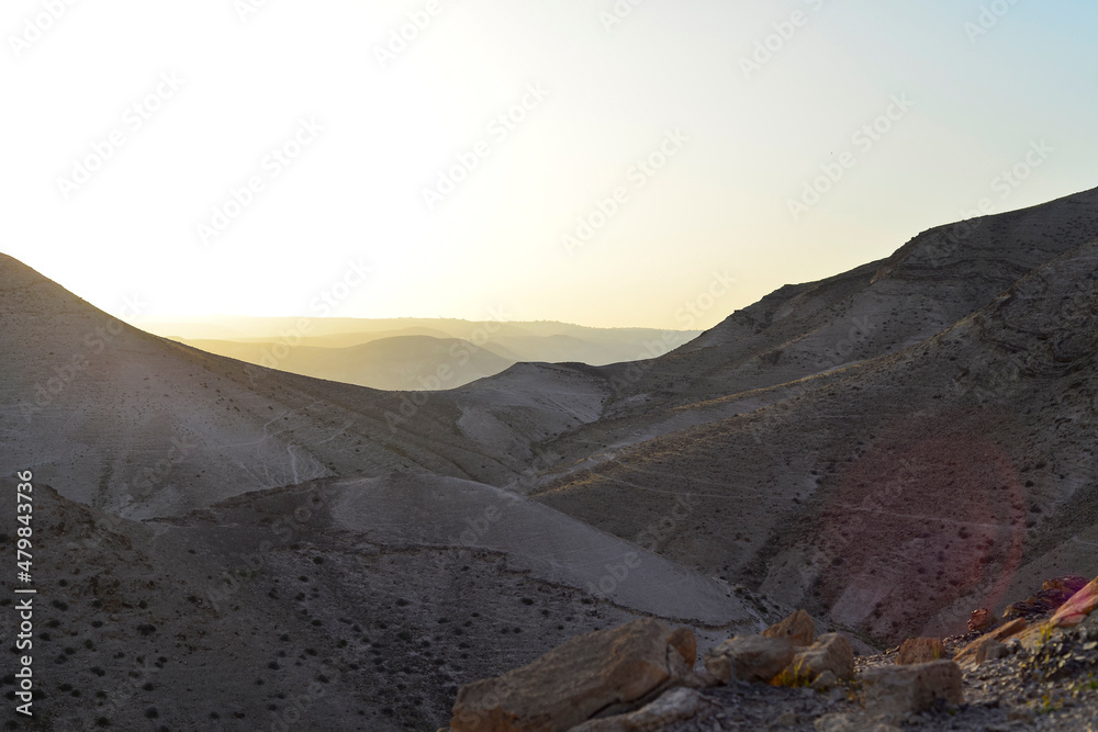 Mountain landscape, desert. Stony desert panoramic view. Unique relief geological erosion land form. Stone Desert on the West Bank. Judean Desert in clear weather. 