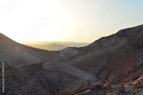 Mountain landscape, desert. Stony desert panoramic view. Unique relief geological erosion land form. Stone Desert on the West Bank. Judean Desert in clear weather. 