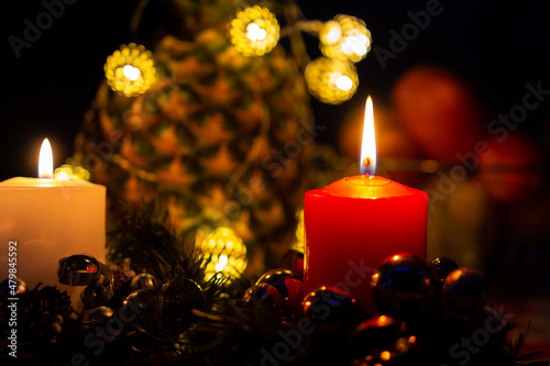 New Year's candle is burning in the dark