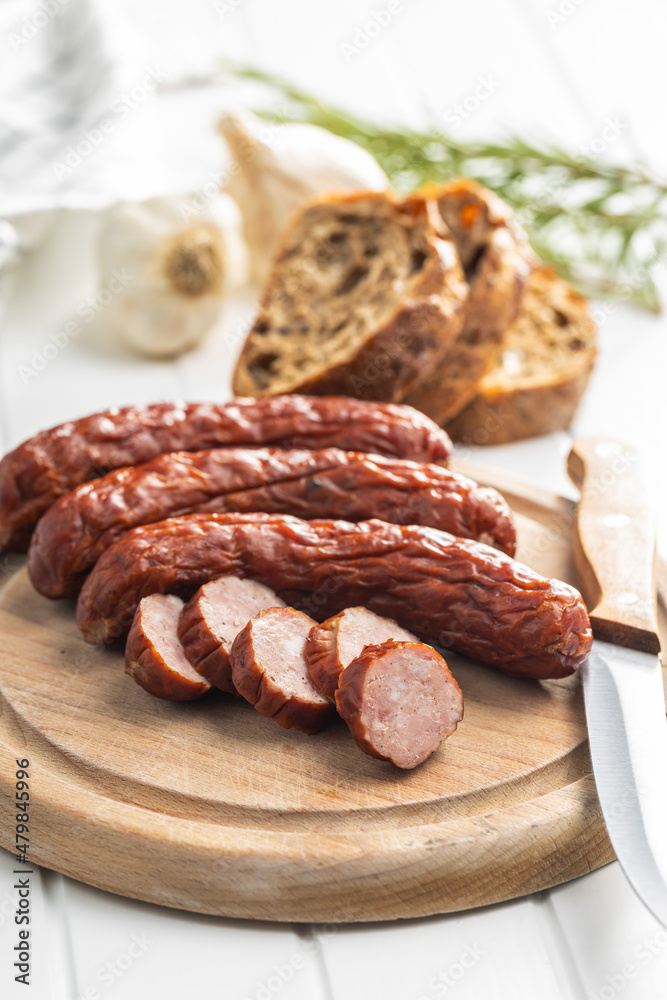 Smoked pork sausages. Sliced salami Smoked pork sausages. Sliced salami