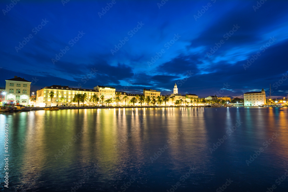 Riva promenade with Diocletian Palace at dawn. Split, Croatia