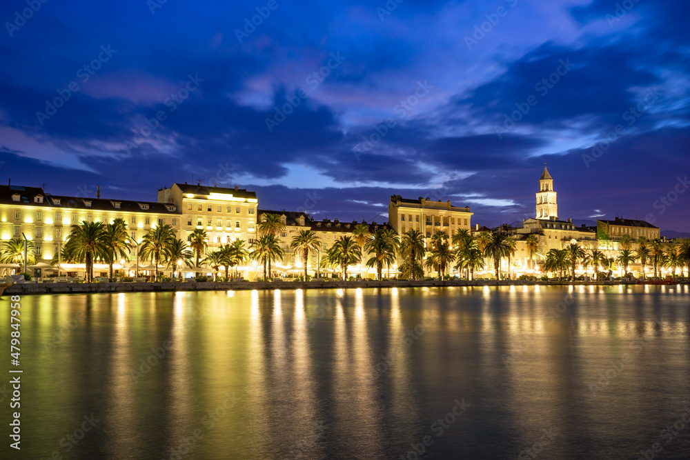 Riva promenade at dawn with Diocletian Palace and St Domnius Cathedral. Croatia