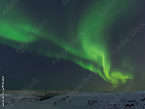 Fototapeta Naklejka Na Ścianę i Meble -  At night in winter, the tundra and the aurora borealis.