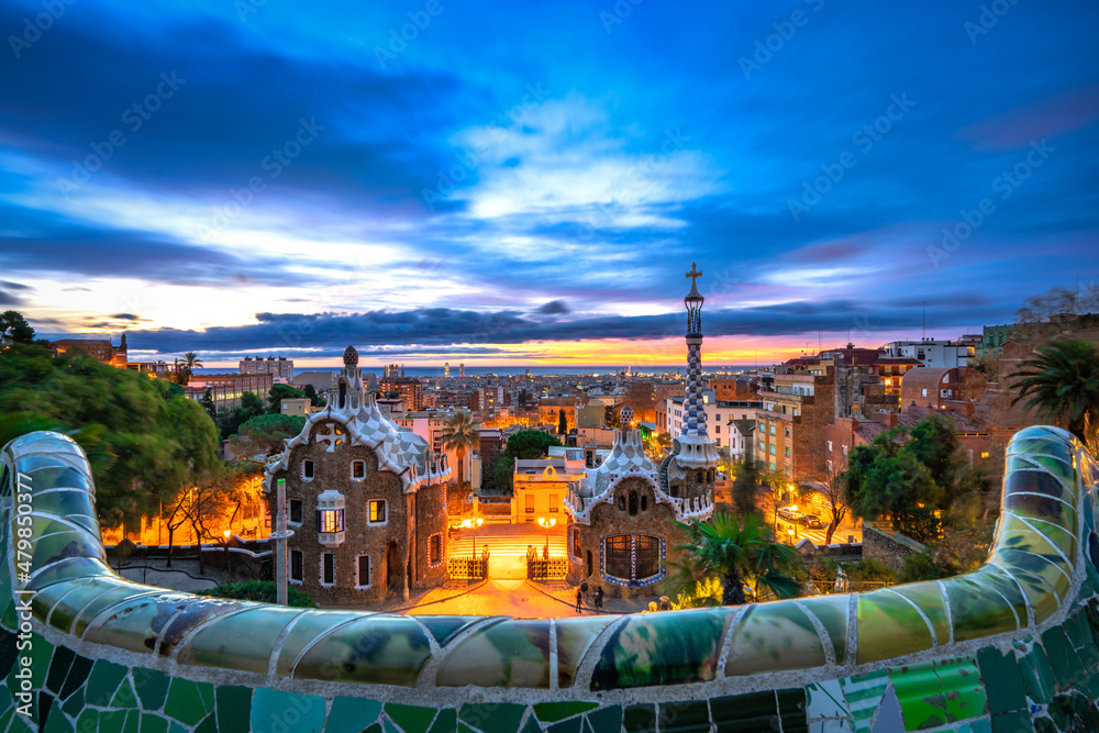 Obraz premium Skyline of Barcelona at dawn seen from Park Guell which was built in 1926