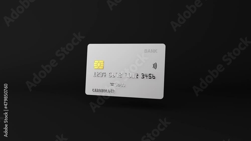 Spinning 3d white plastic credit debit card animation on black dark background in a seamless visualisation loop. Mock up business money bank holder account in 4k graphics, online payments, transaction photo