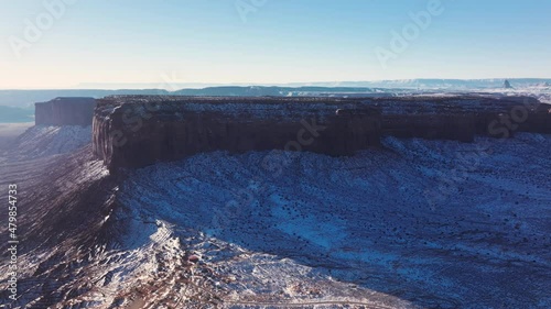 Wallpaper Mural Scenic winter desert nature landscape, travel background, copy space Arizona USA 4K. Cinematic Monument Valley park on sunny winter day with fresh white snow covering red sandstone desert mountains Torontodigital.ca