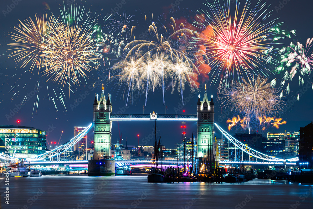 Tower Bridge with fireworks display in London.  England