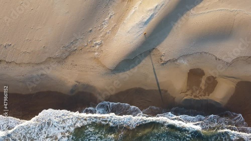Video zenital de la playa de Xeraco (Valencia - España) tomado con drone en 4k. photo