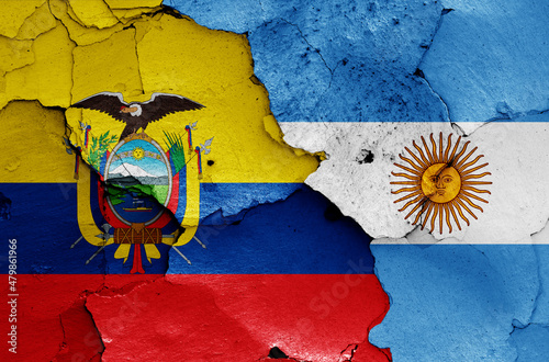 flags of Ecuador and Argentina painted on cracked wall