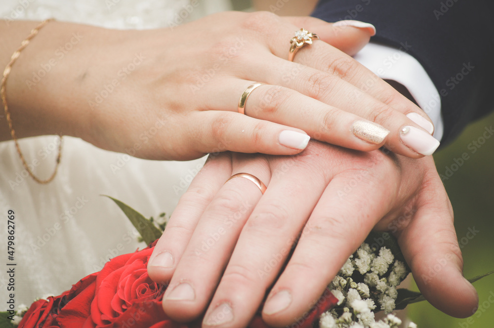 wedding rings on hands