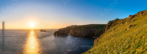 Land's End with Enys Dodman arch at sunset, Cornwall. United Kingdom photo