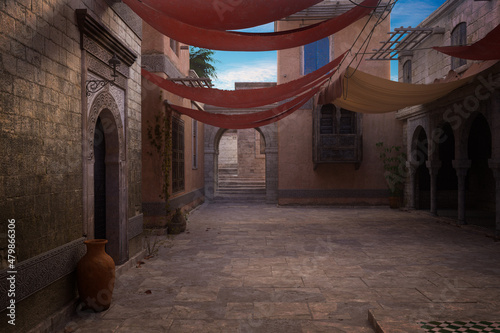 Empty courtyard in an old medieval Moroccan town with an archway leading to steps on the far side. 3D illustration.