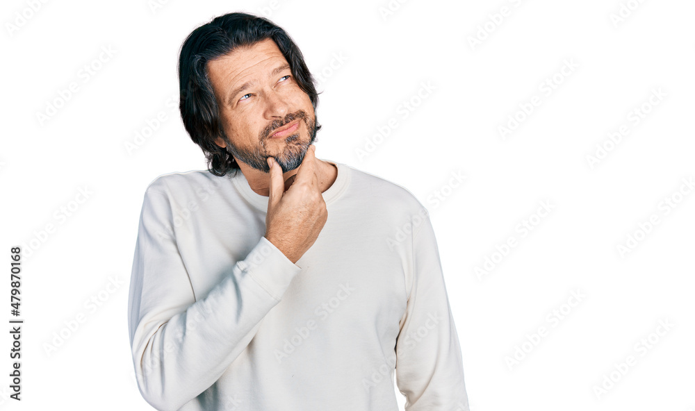 Middle age caucasian man wearing casual clothes touching painful neck, sore throat for flu, clod and infection Middle age caucasian man wearing casual clothes touching painful neck, sore throat for flu, clod and infection
