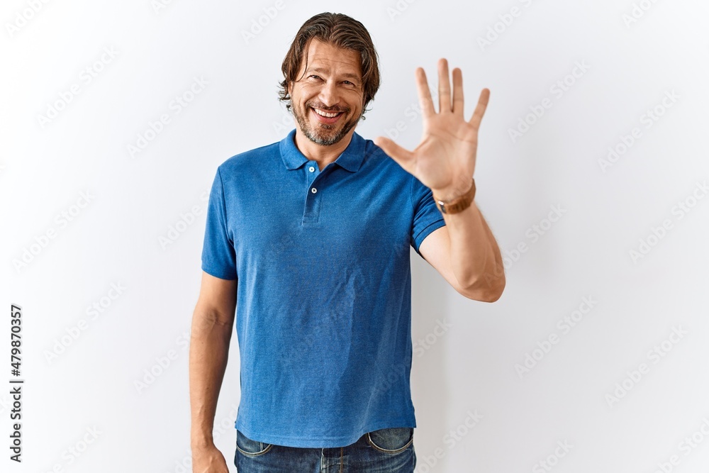 Handsome middle age man standing together over isolated background showing and pointing up with fingers number five while smiling confident and happy. Handsome middle age man standing together over isolated background showing and pointing up with fingers number five while smiling confident and happy.