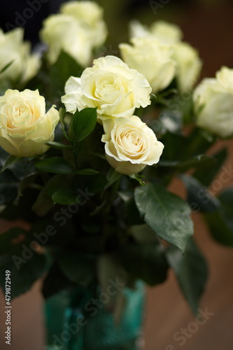 Roses handed out at a wedding reception and included in the bride s bouquet.