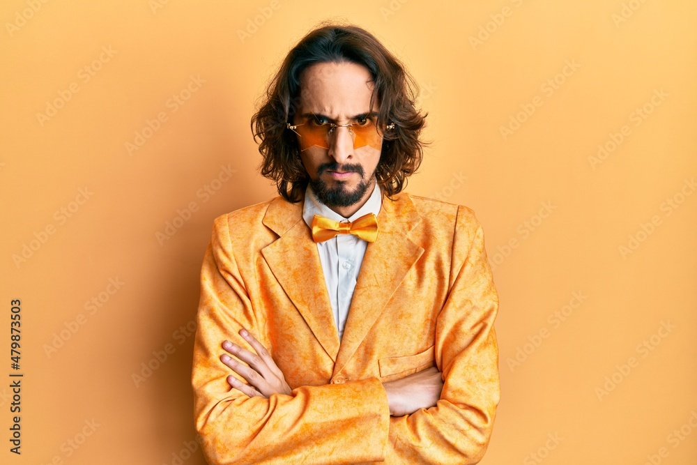 Fototapeta premium Young hispanic man wearing hipster elegant look skeptic and nervous, disapproving expression on face with crossed arms. negative person.