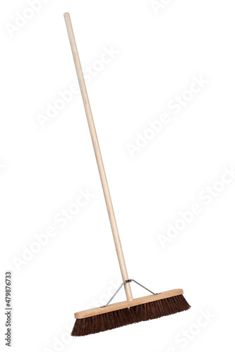 Wooden yard broom inclined left on white background