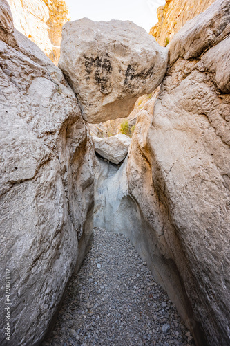 Large Boulder Wedged Above Narrow Slot Canyon photo