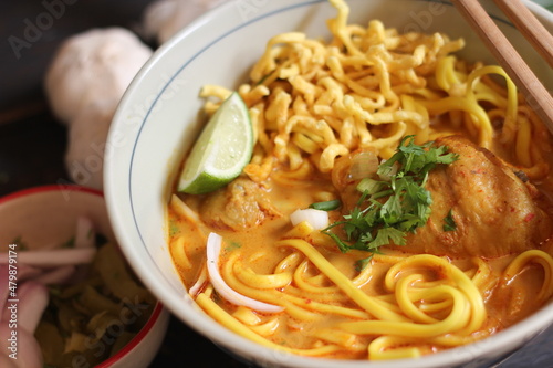 Khao Soi Recipe,Khao Soi,Khao Soi Kai, Thai Noodles Khao Soi, Chicken Curry with seasoning served on wooden table