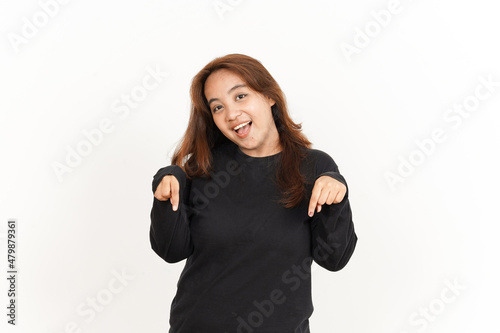 Presenting and Pointing Down or copy Space Of Beautiful Asian Woman Wearing Black Shirt