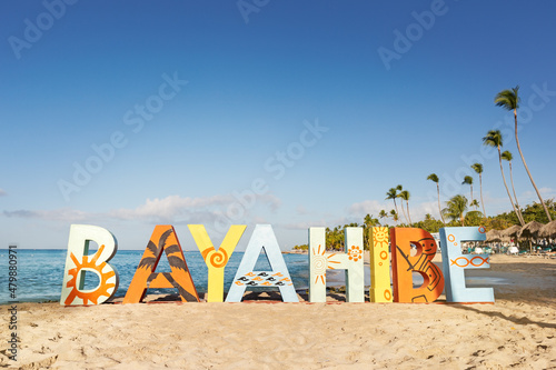 Bayahibe inscription word on Dominicus beach, copy space photo
