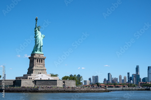 The Statue of Liberty at New York City in clear sunny day © Kenishirotie