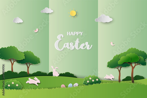 Happy easter greeting card on green paper craft background rabbits jumping on grass for festive spring holiday poster banner or wallpaper