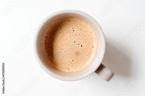 Top view of A glass of Coffee on White Background © anson_adobe