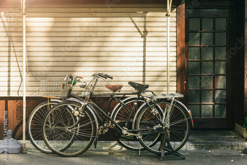 vintage bicycle parking at the street in Japan