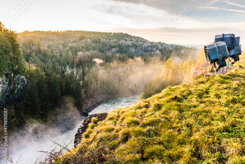 snowqualmie fall at sunset with a lot of fog. photo