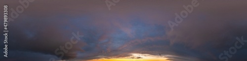 Dramatic sunset sky panorama with Cumulus clouds. Seamless hdr 360 pano in spherical equirectangular format. Complete zenith for 3D visualization, game and sky replacement for aerial drone panoramas