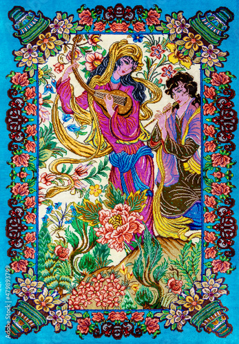 Iranian handmade silk carpet with the legendary design of Layla and Majnun