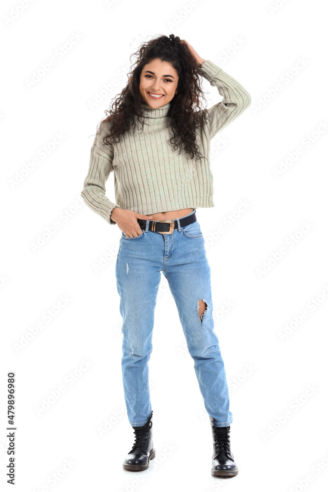 Pretty young woman in warm sweater on white background Pretty young woman in warm sweater on white background