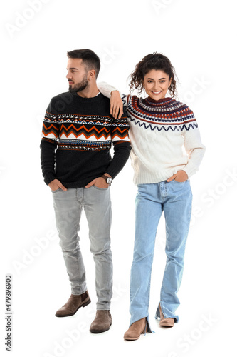 Happy young couple in warm ...