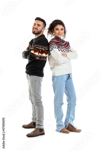 Happy young couple in warm ...