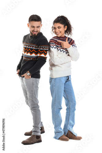 Happy young couple in warm ...